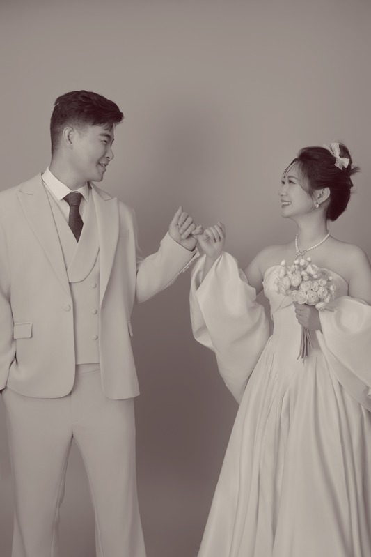 Dylan and Steven holding hands